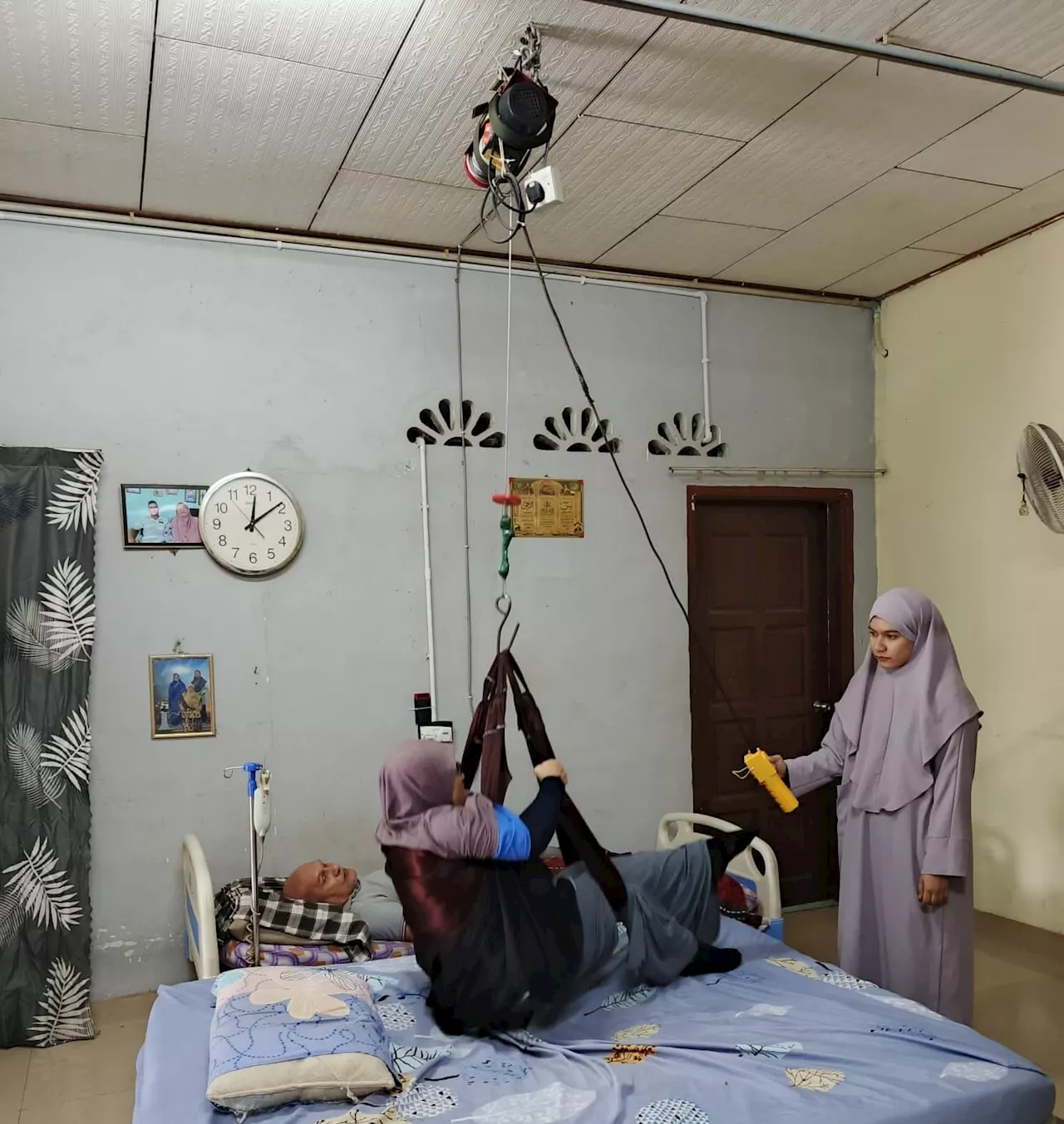 Malaysian Father Installs Crane to Help Move Disabled Parents