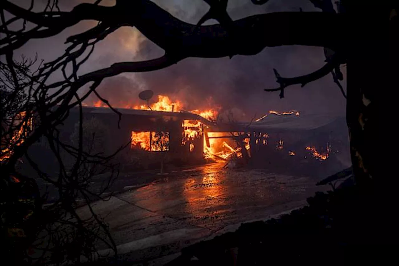 The Palisades Fire Burns a Residence in Pacific Palisades