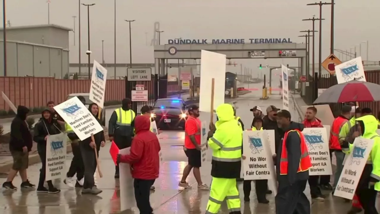 Dock workers reach tentative agreement with ports, shippers, averting a potential strike