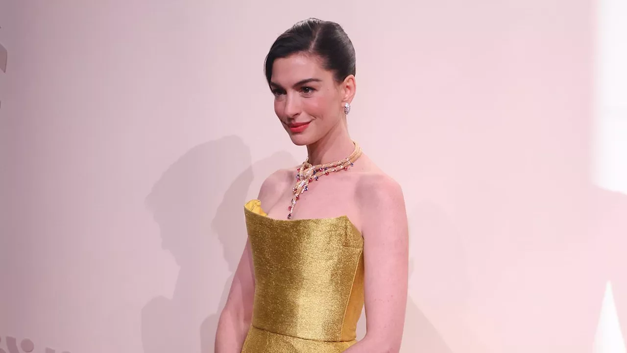 Anne Hathaway glams up in golden gown at Bulgari event in China amid LA wildfire chaos