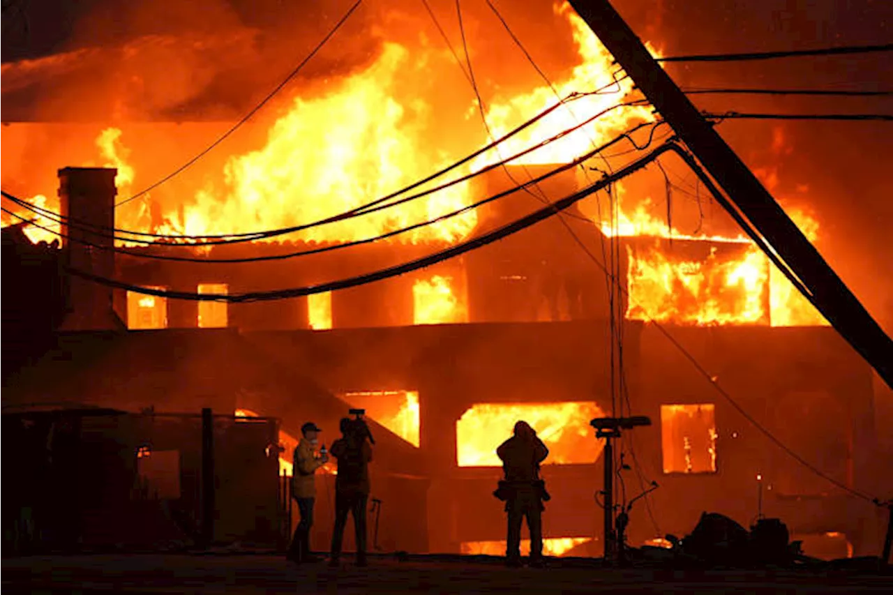 Out-of-control Los Angeles wildfires burn thousands of homes and other structures