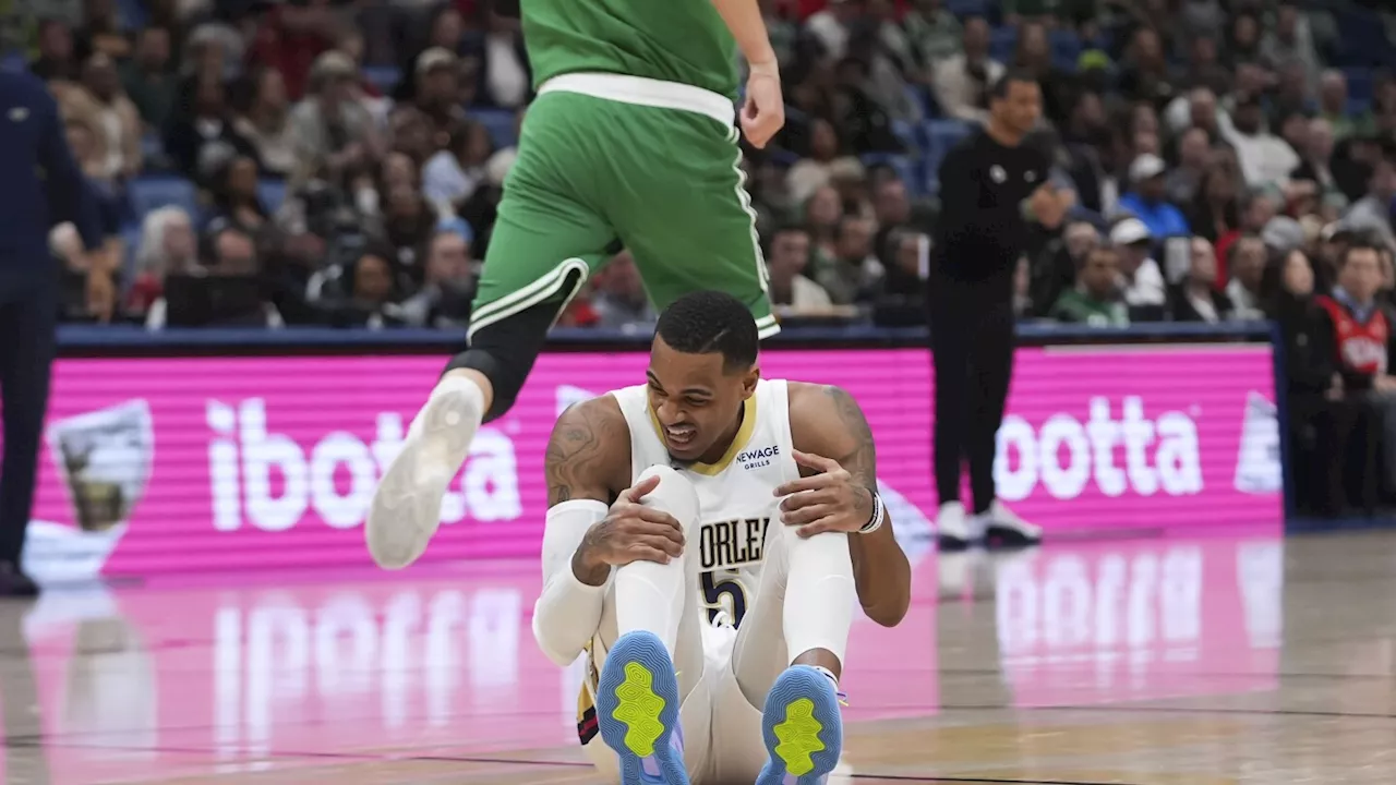 Pelicans' Dejounte Murray suffers lower right leg injury vs. Celtics