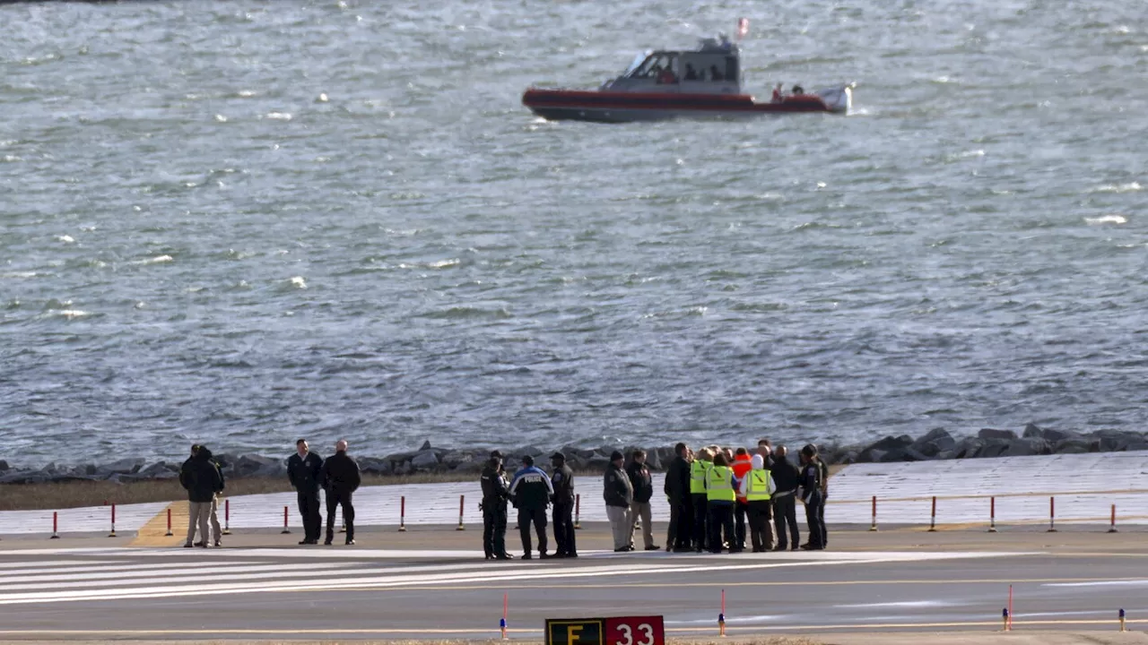 Recovery crews return to the Potomac debris after the deadly