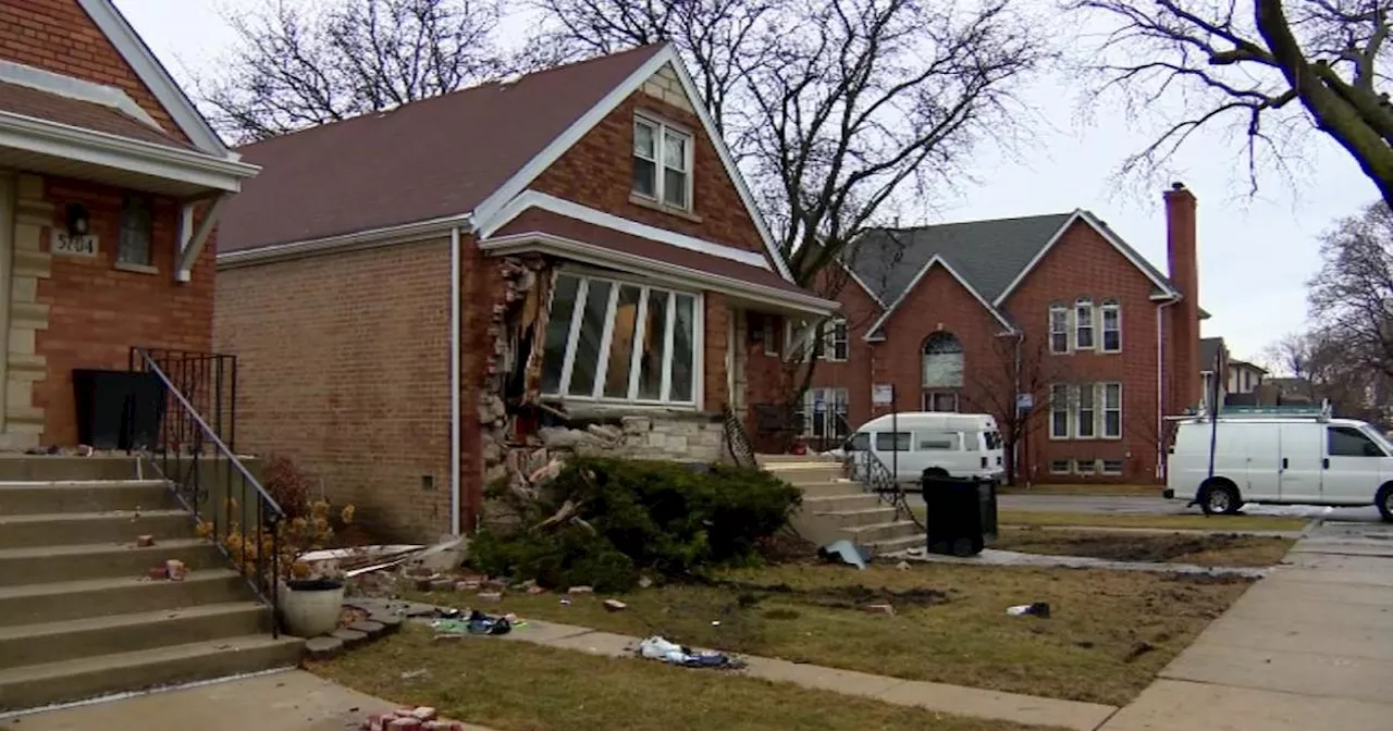 SUV Crashes Into Chicago Home, Occupants Speed Away