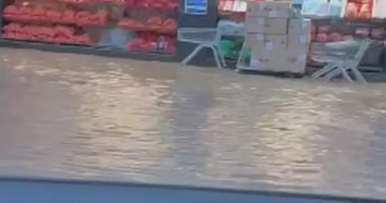 Busy Glasgow southside road flooded as homes left without water