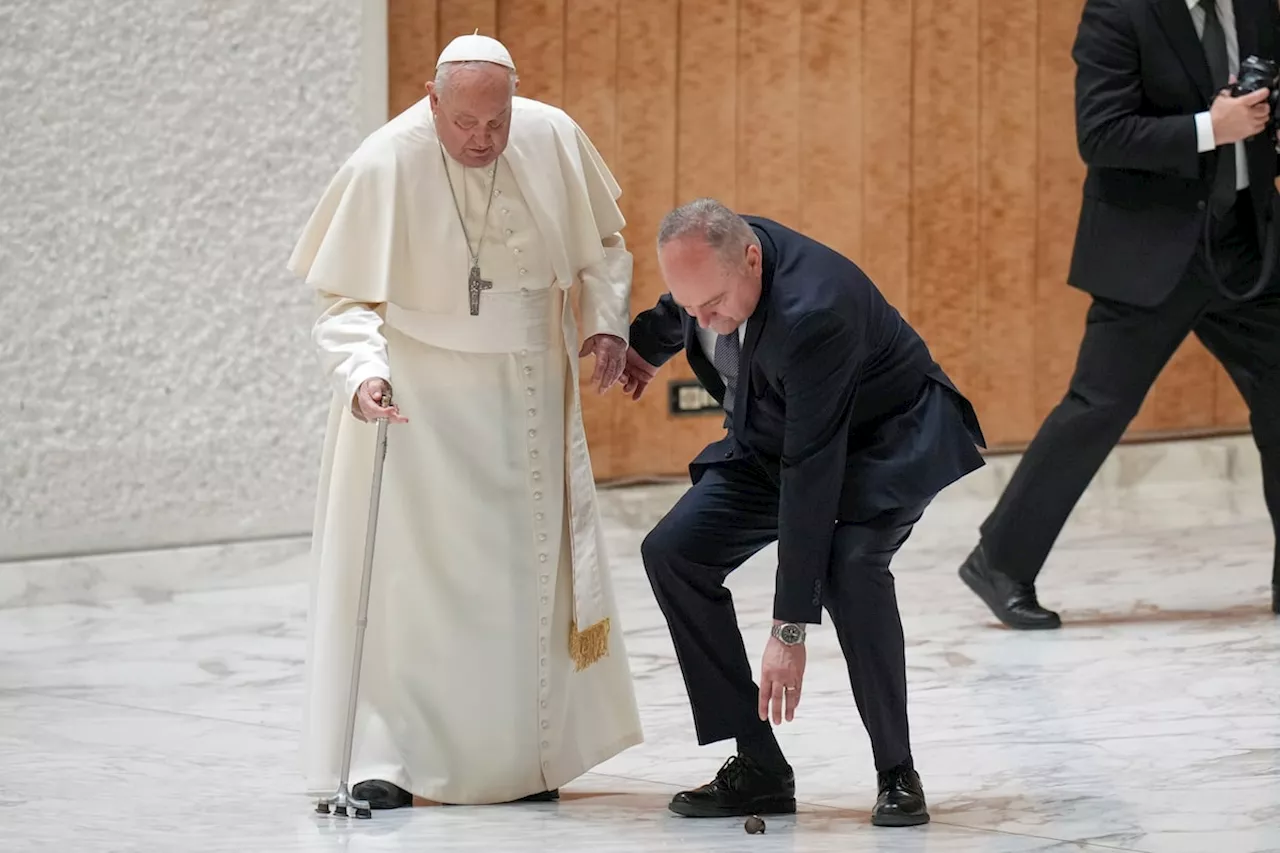 Pope Francis stumbles while walking into Jubilee audience at the Vatican as his walking stick snaps