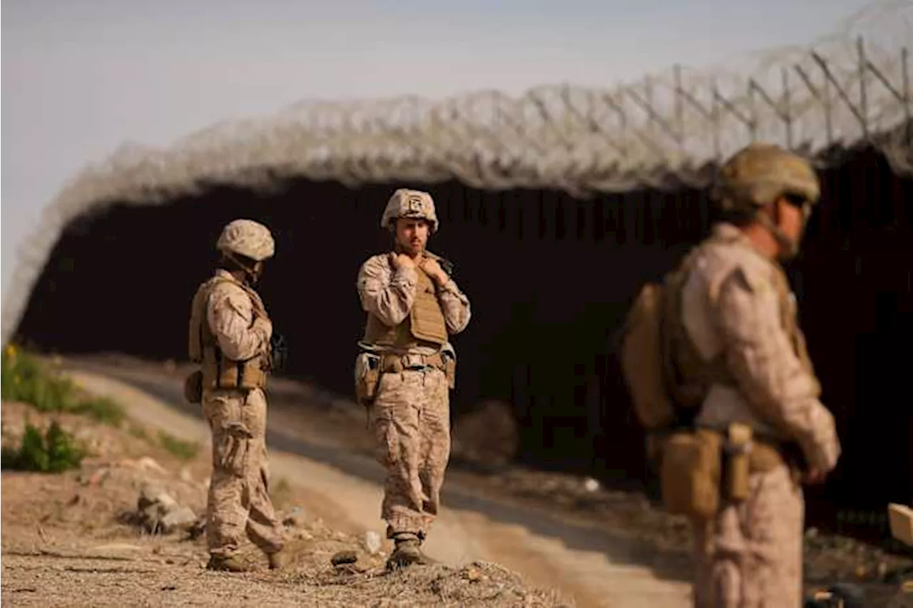 Marines Install Barbed Wire Along Border Fence Amid Trump's Intrusion Threats