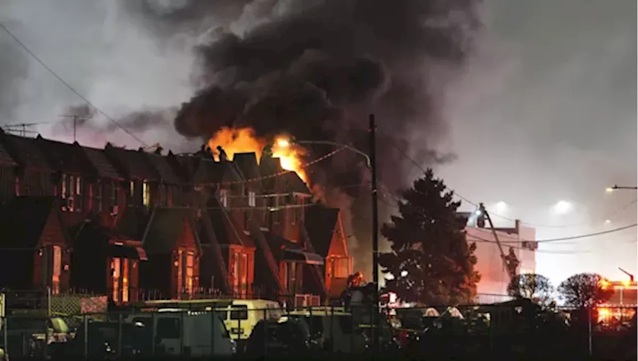 A medical plane carrying a child patient and 5 others crashes in Philadelphia, setting homes ablaze