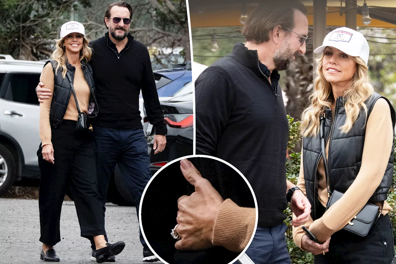 Kevin Costner's ex-wife Christine Baumgartner flashes engagement ring after moving on with his ex-pal