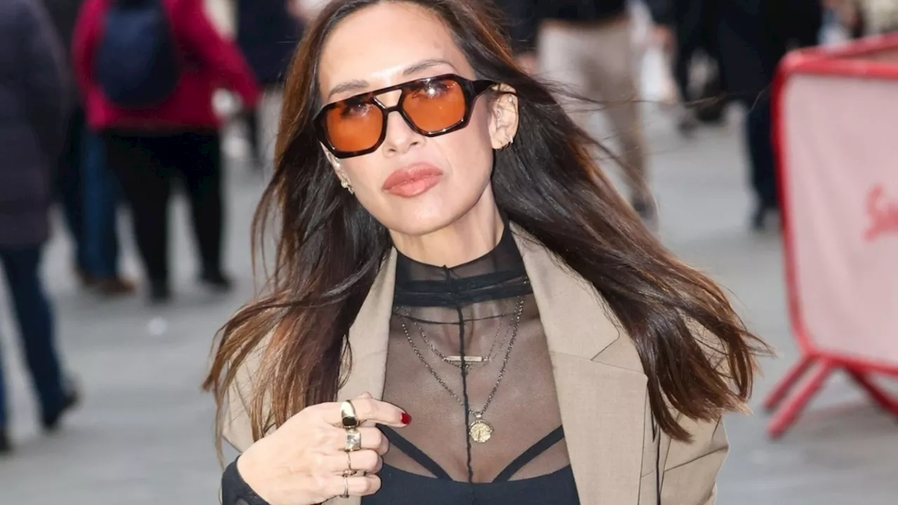 Myleene Klass shows off her toned tum in see-through top as she’s pictured in Central London...