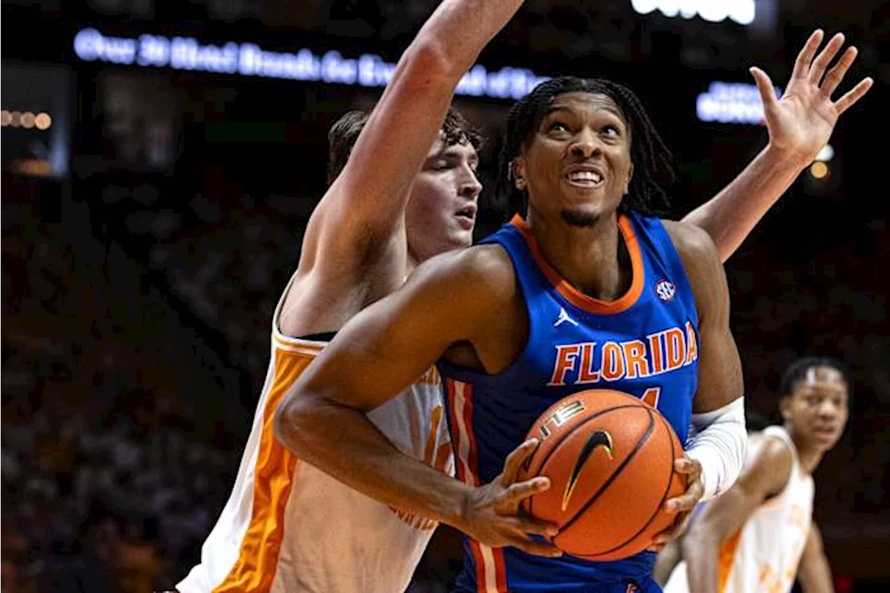 Shorthanded No. 8 Tennessee beats No. 5 Florida 64-44