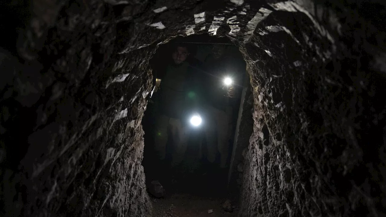 Syrians returning to the town of Tel Rifaat find homes in ruins and underground tunnels