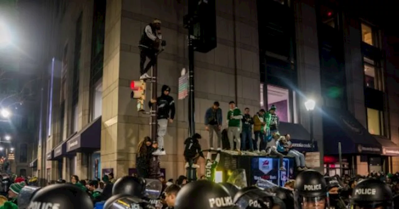 Eagles Fans Celebrate Super Bowl Victory with Unruly Climbs