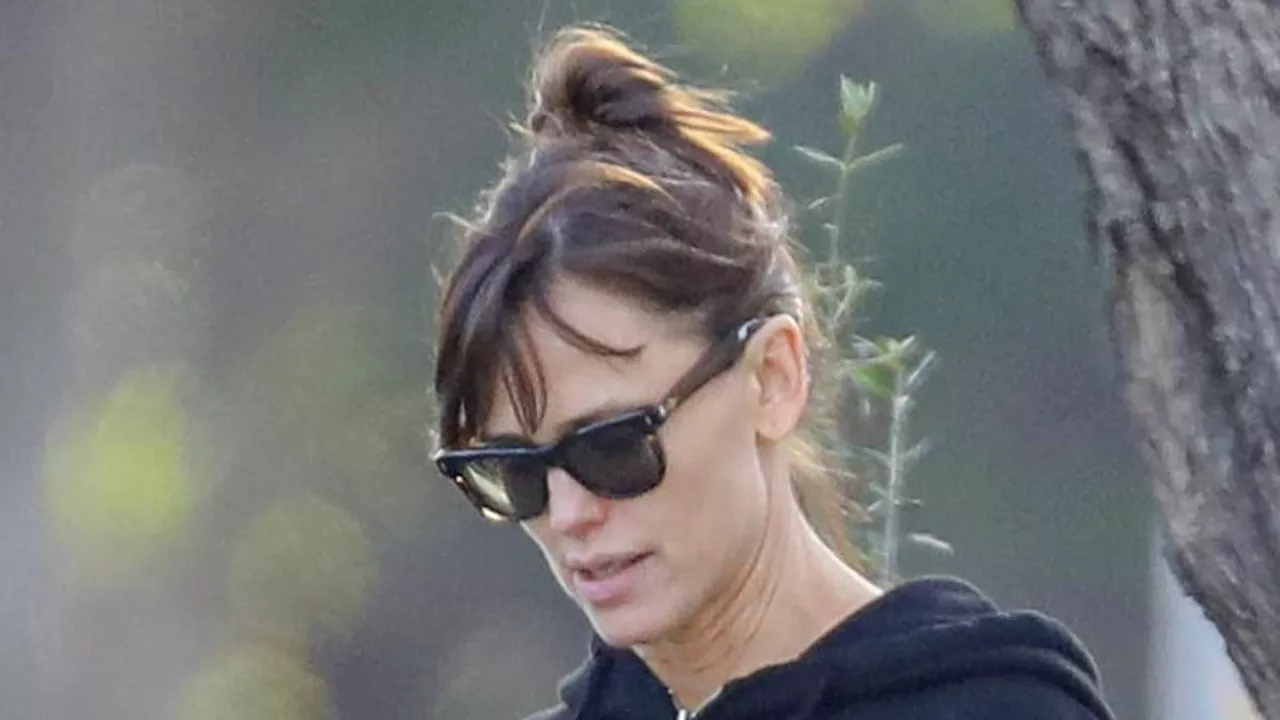 Jennifer Garner enjoys quality time with middle child Fin while Ben Affleck smokes on his way to...