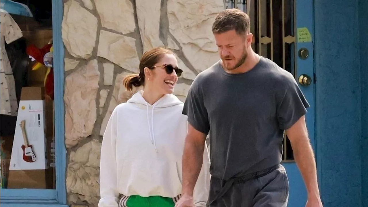 Minka Kelly holds hands with boyfriend Dan Reynolds during coffee run with their dog in Los Angeles