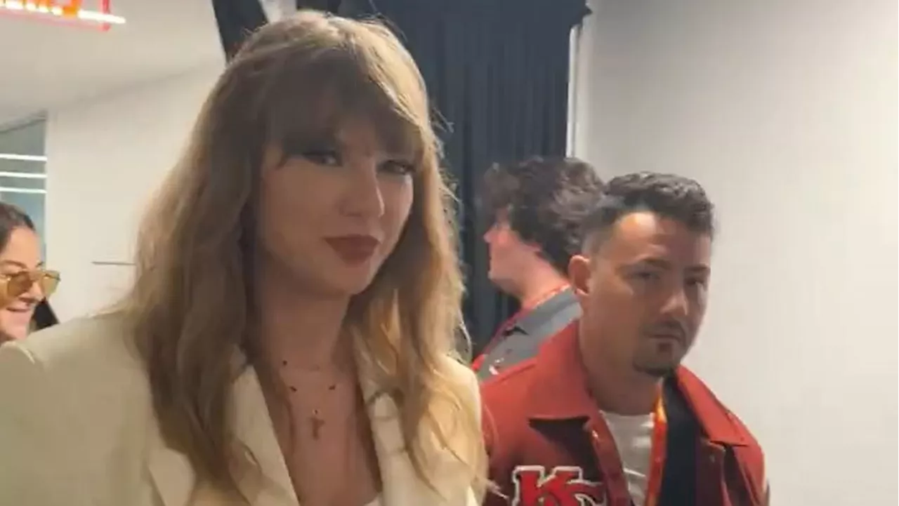 Taylor Swift Cheers on Travis Kelce at Super Bowl, Embracing White Jersey Tradition Amidst Family Rivalry