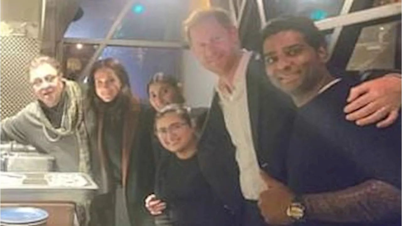 Prince Harry and Meghan Markle celebrate opening of Invictus Games with pop star Michael Buble and...