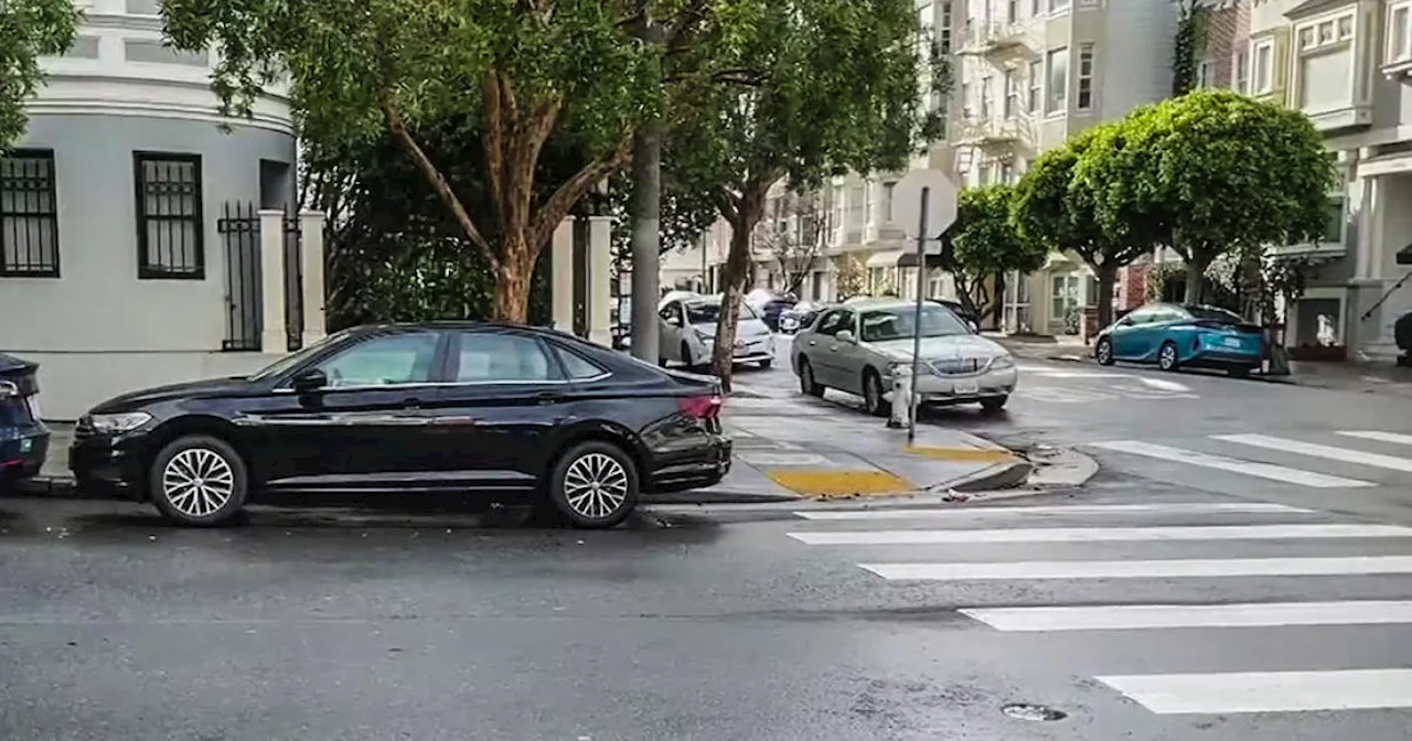 San Francisco delays parking tickets over 'daylighting' law; sets 18 month goal to paint curbs red