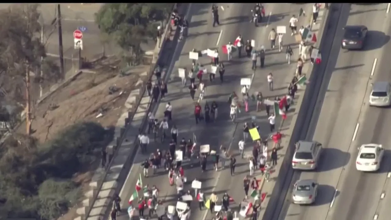 Man charged for allegedly throwing two books onto 101 Freeway during immigration protest in LA