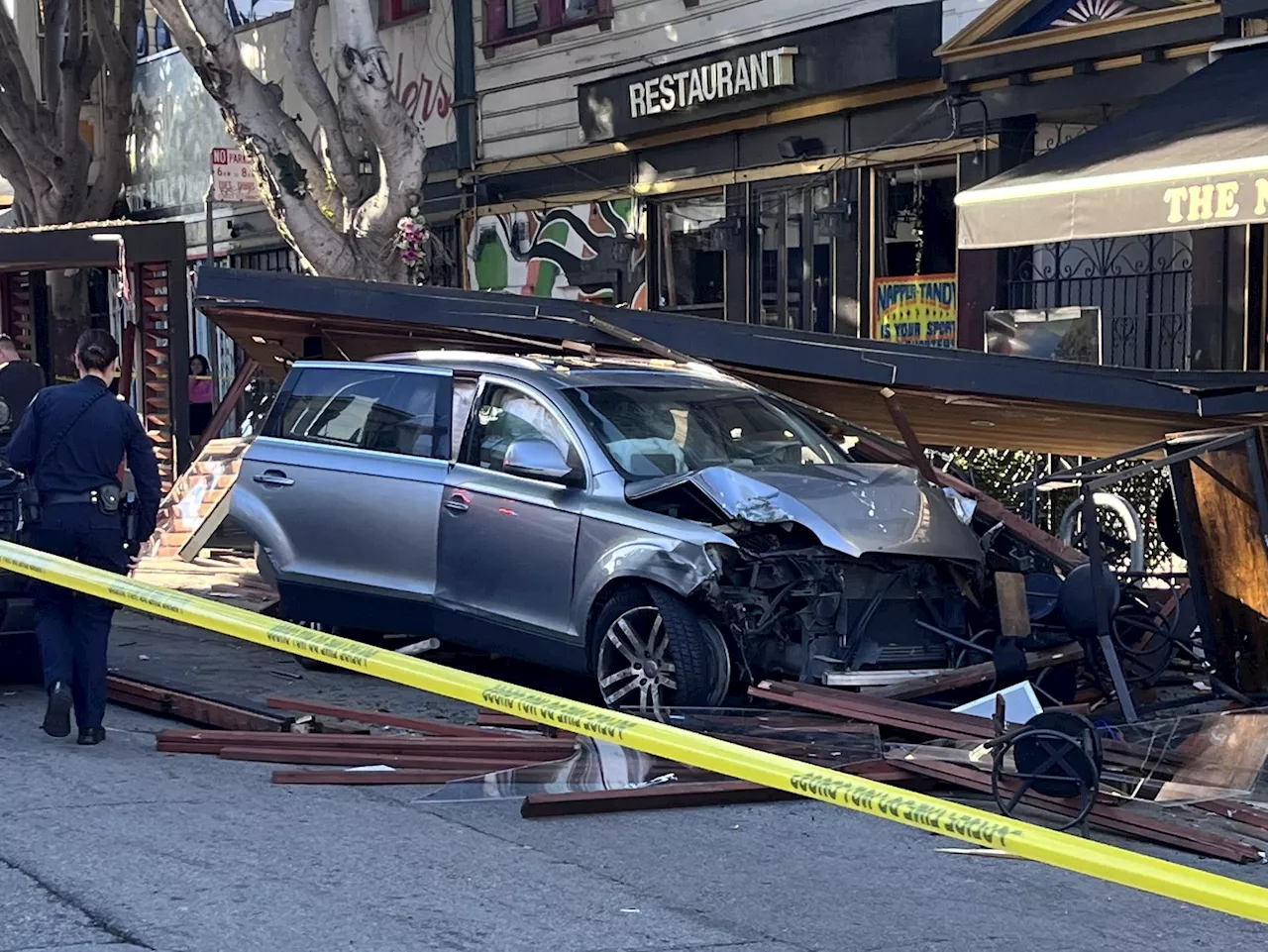 Silver SUV Crashes into Napper Tandy's Parklet, Injuring Six