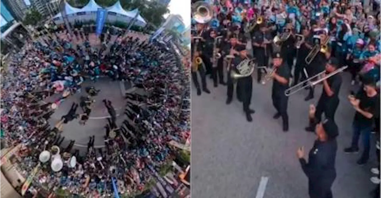 PDRM marching band plays K-pop hit at Sarong Music Run