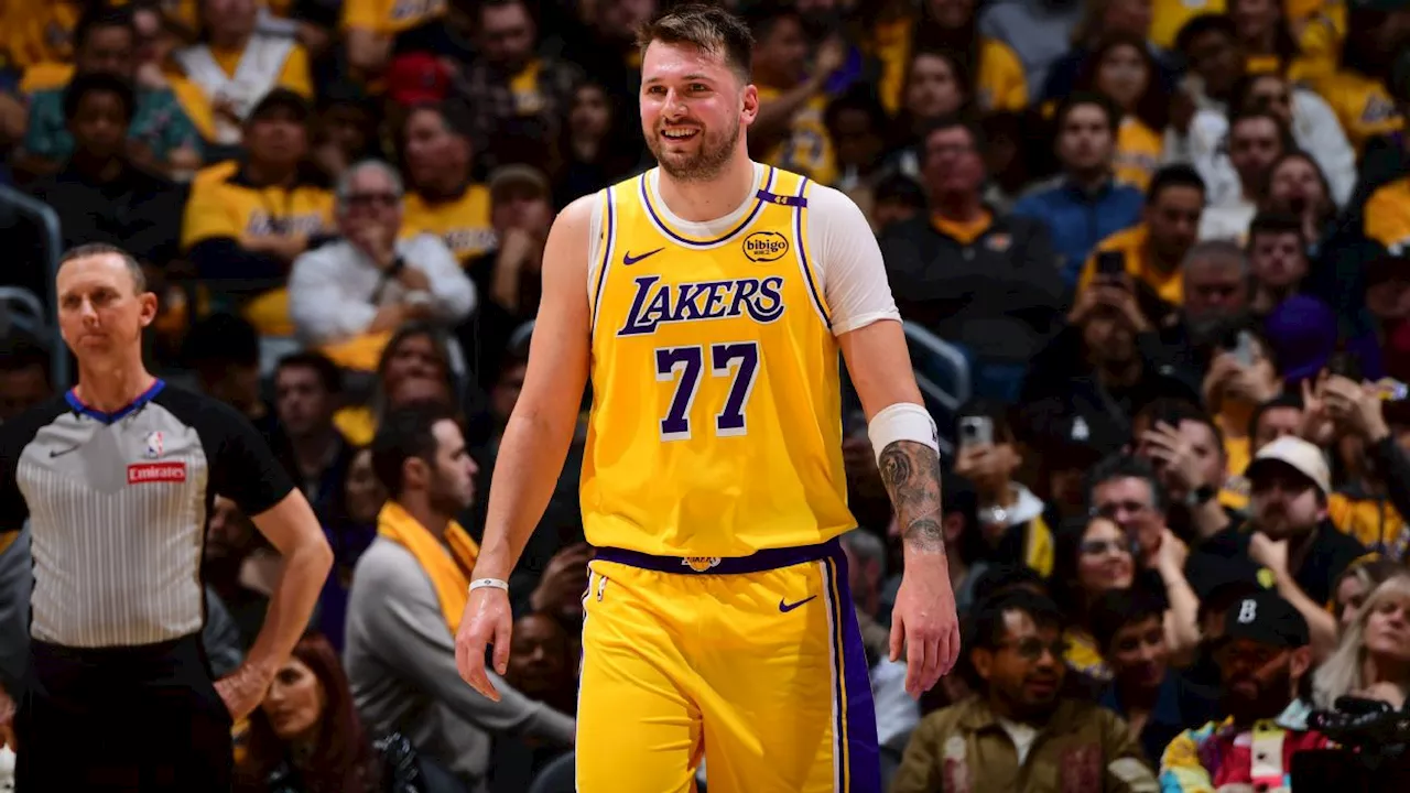 Luka Doncic scores 14 points in winning debut for Lakers