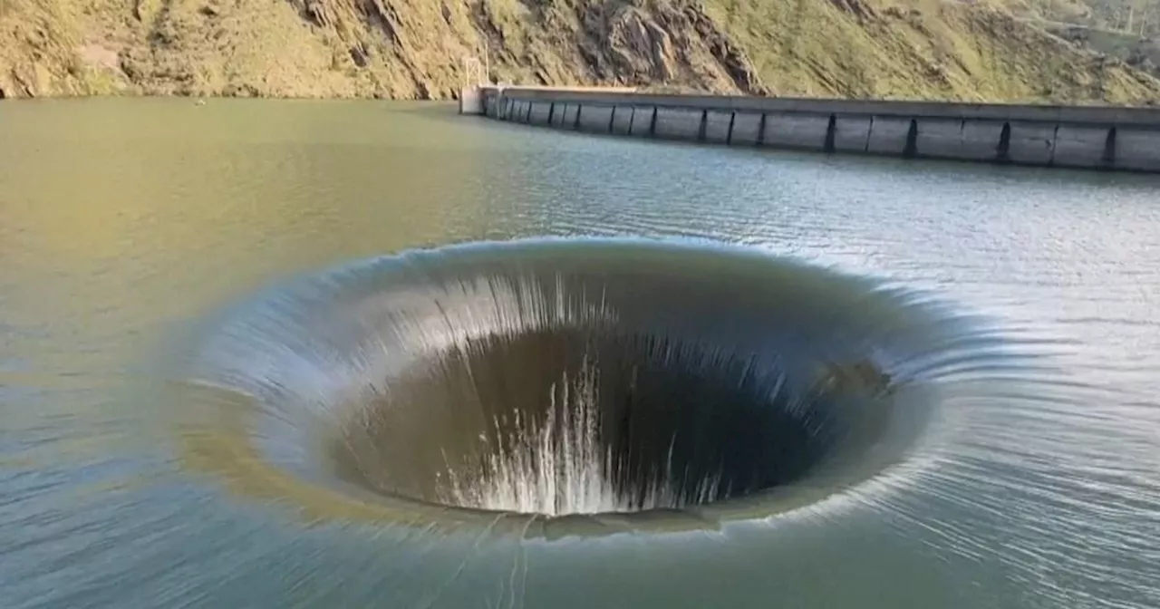 Gigantic spinning 'Glory Hole' filmed as it sucks down fluid