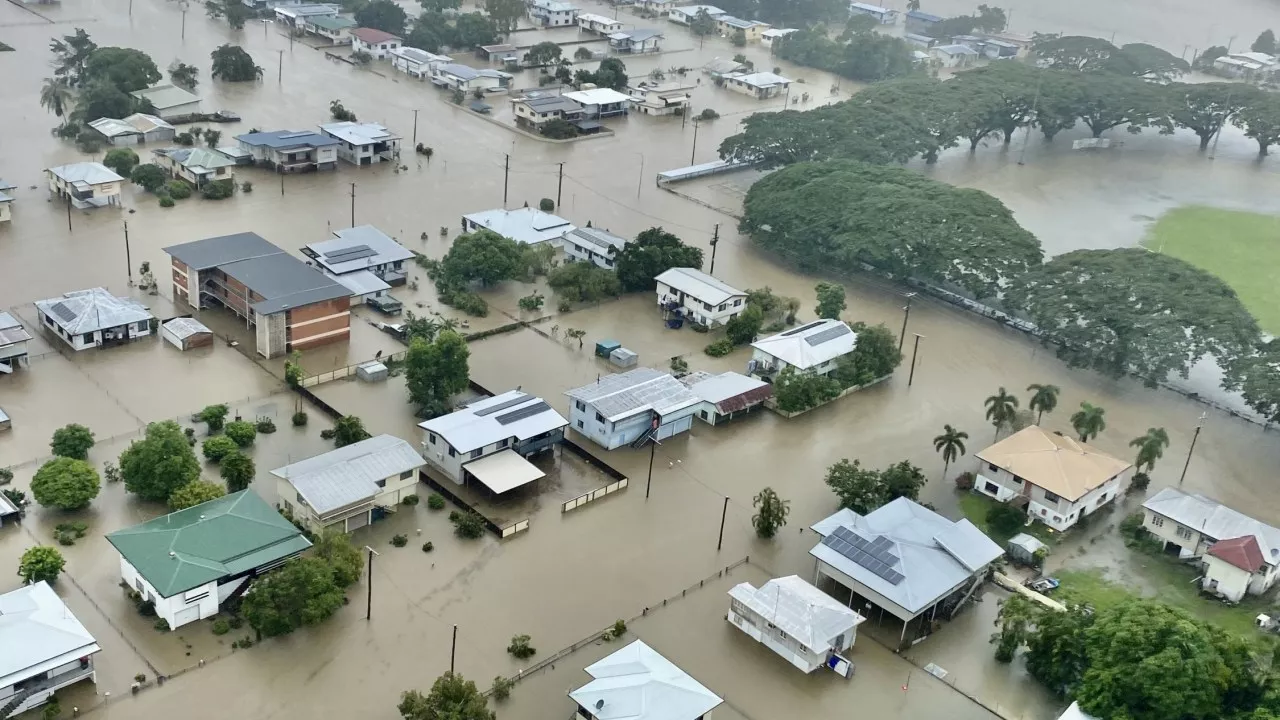 Grim rain forecast for flooded North Qld as Sydney braces for storm threat