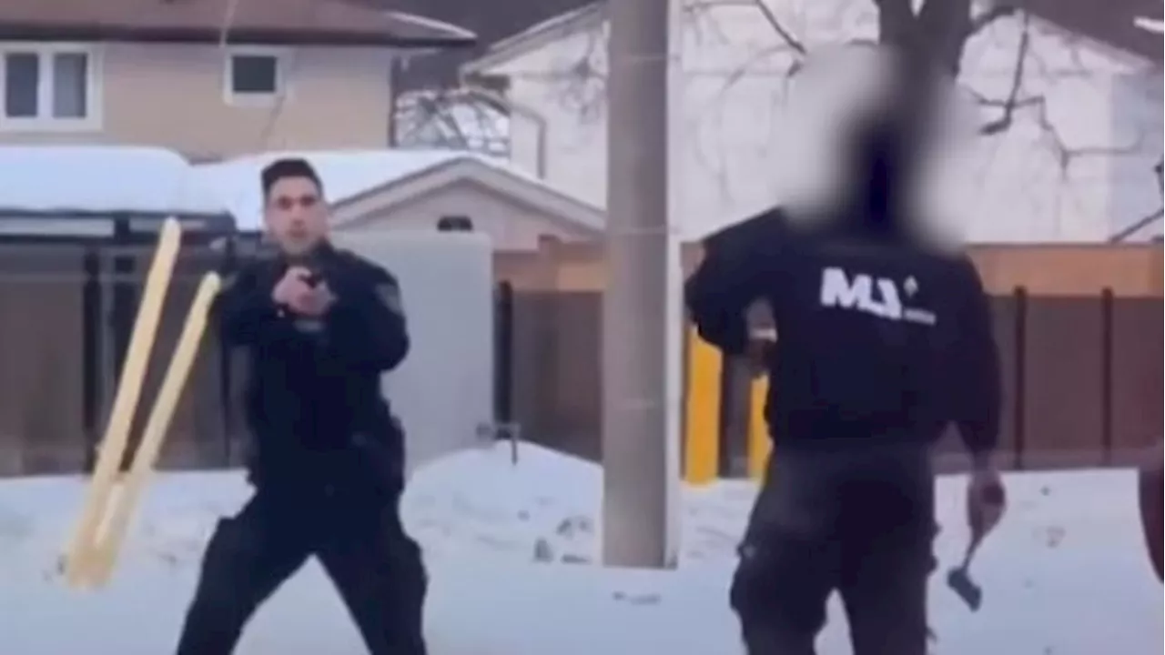 Officer's De-escalation Tactics Prevent Injury in Dramatic Standoff with Hatchet-Wielding Man