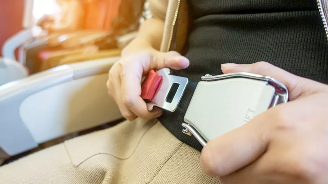 Viral Seatbelt Hack for Sleeping on Flights Sparks Safety Concerns