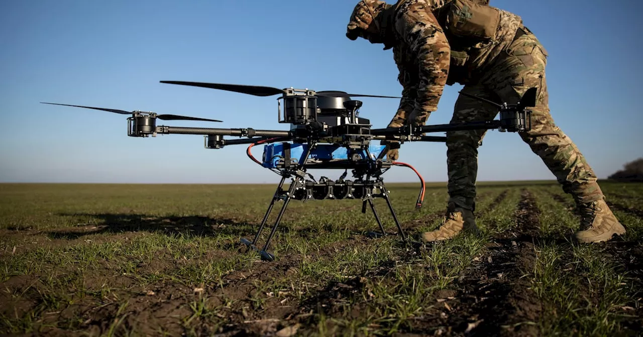 Ukrainian Serviceman Prepares Vampire Attack Drone Near Front Line