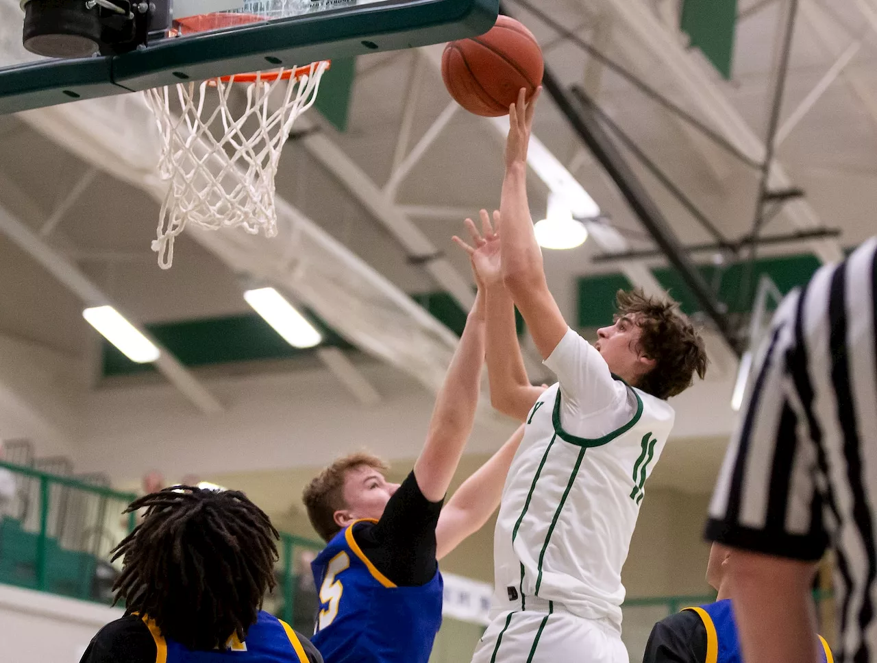 Schlager scores 2,000th career point, Trinity boys basketball rolls to conference title game