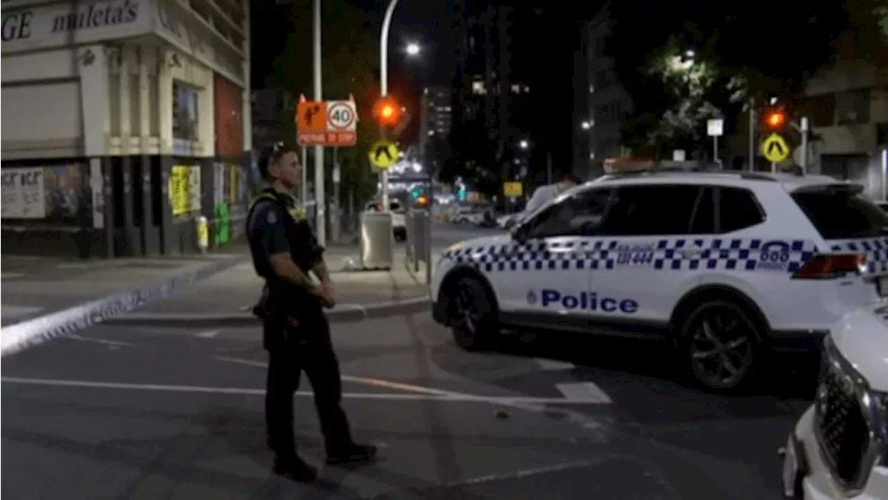 Hunt for armed attacker who stabbed young man in Melbourne’s CBD