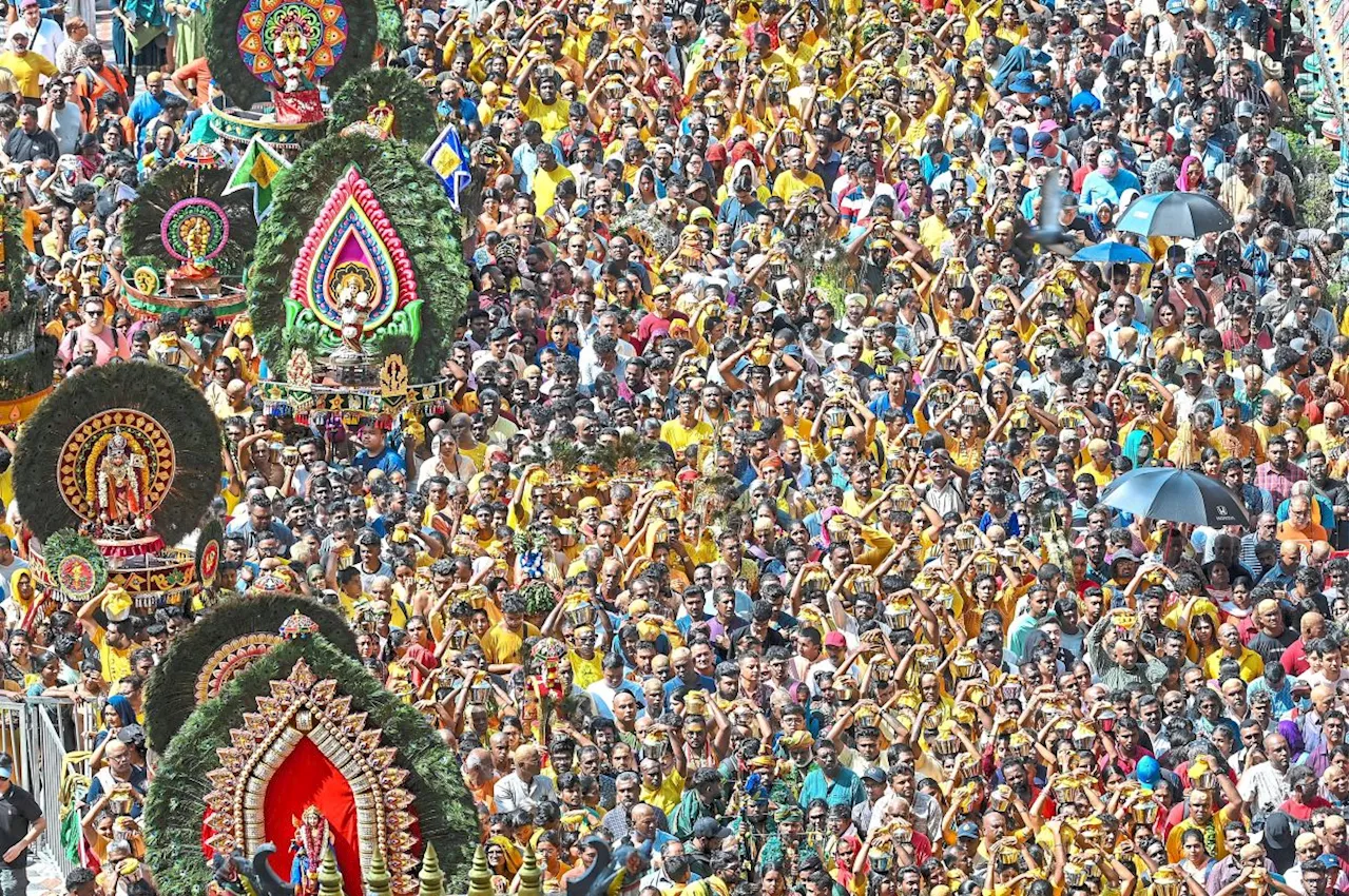 A Sea of Devotees at Batu Caves Celebrates Thaipusam