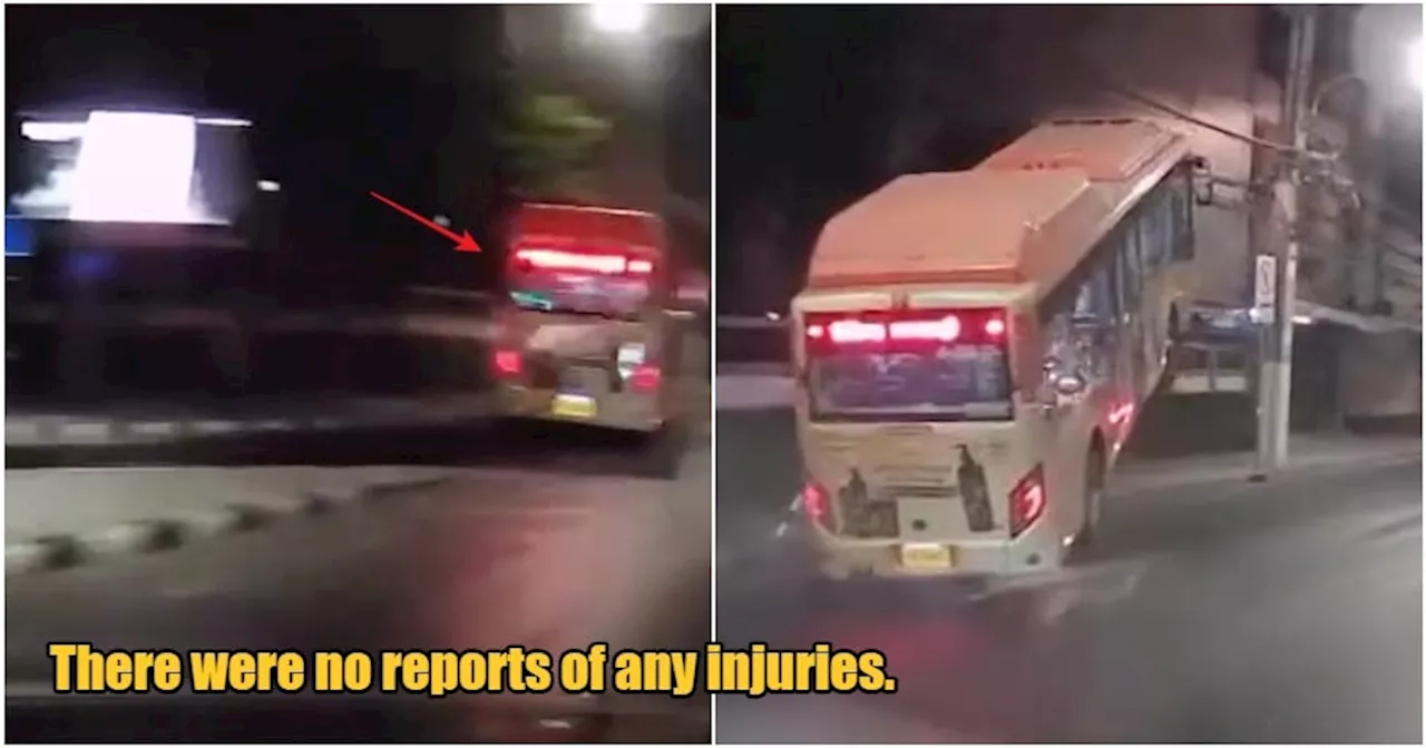 Bus in Bangkok Dangles Precariously Above Road After Mirror Snags Cables