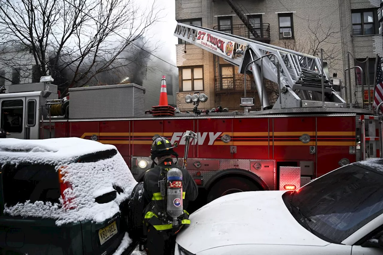 Two people dead in Bronx fire at Buddhist temple and home; blocked hydrant hinders FDNY efforts