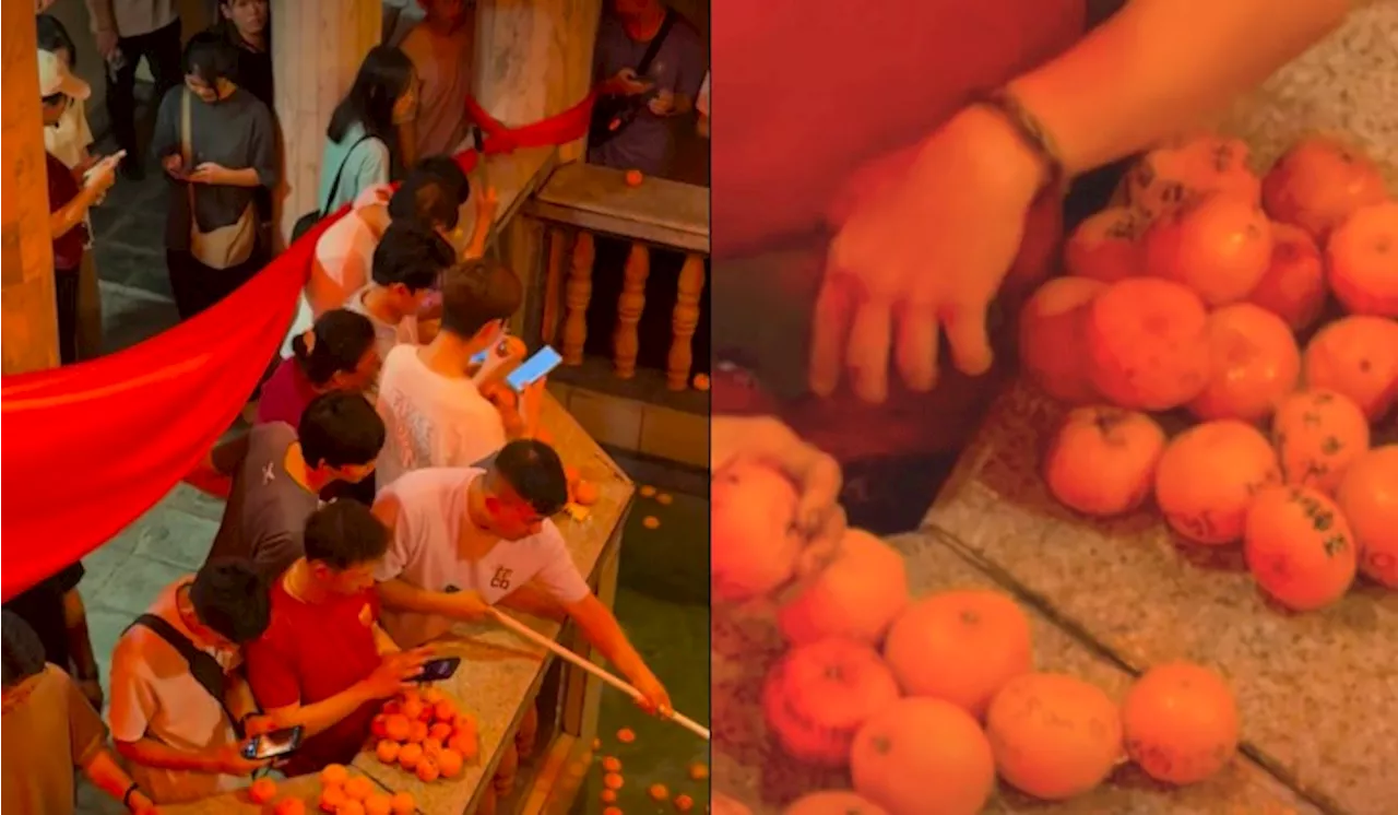 Mandarin Orange Matchmakers Gone Rogue at Penang Temple