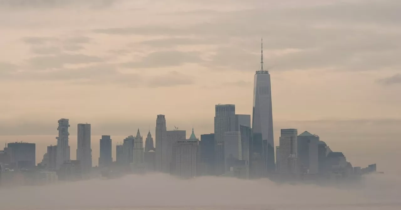 Fog blankets Lower Manhattan skyline