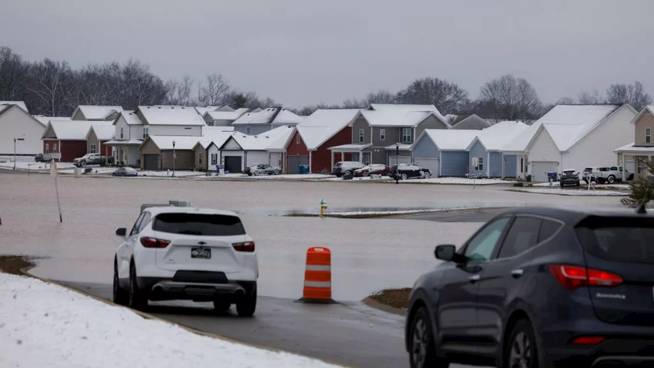 Levee fails in Tennessee flooding; 8 dead in Kentucky as rescues continue