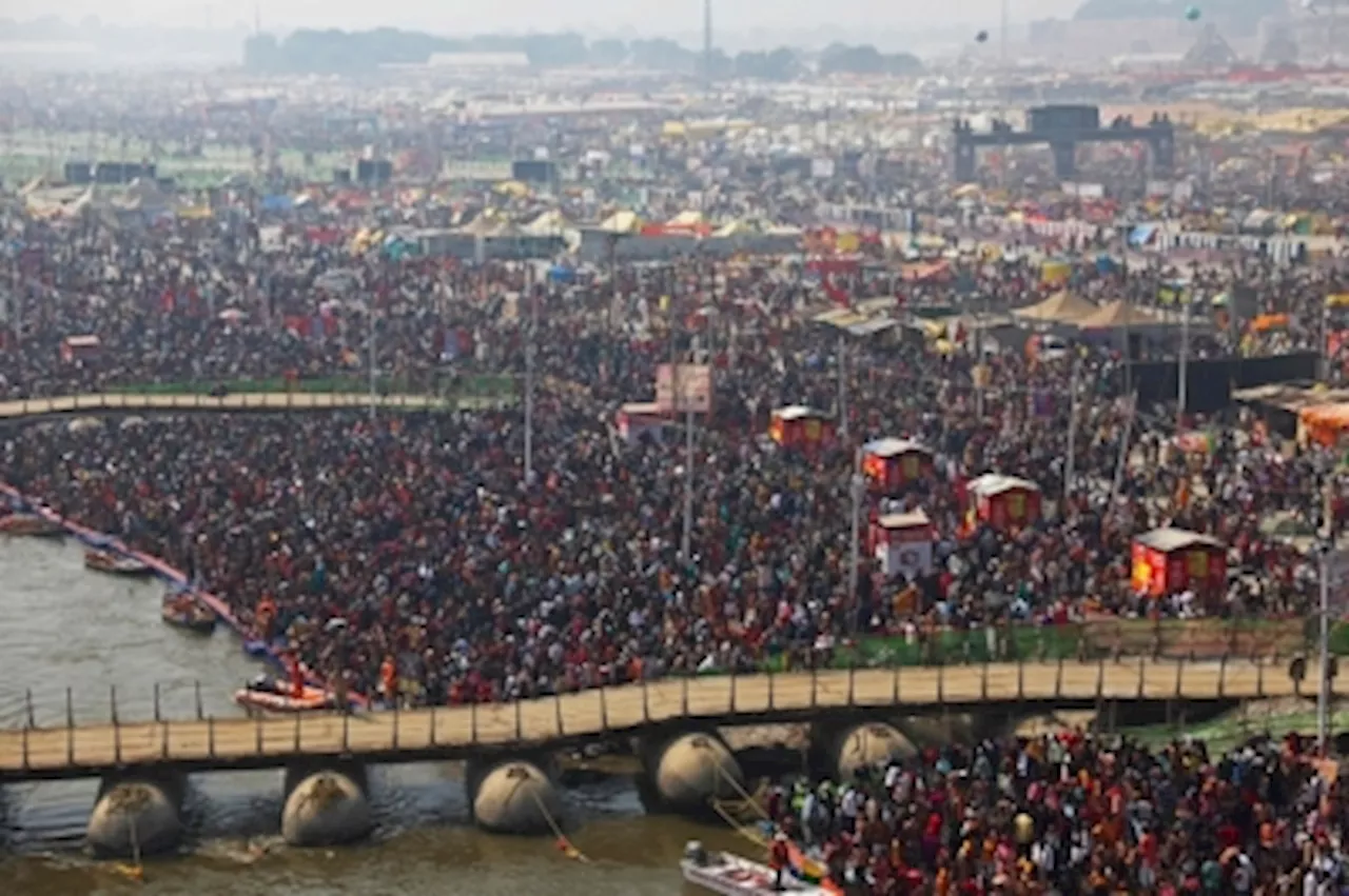 Stampede to catch trains to India’s Hindu religious mega-festival leave at least 15 dead