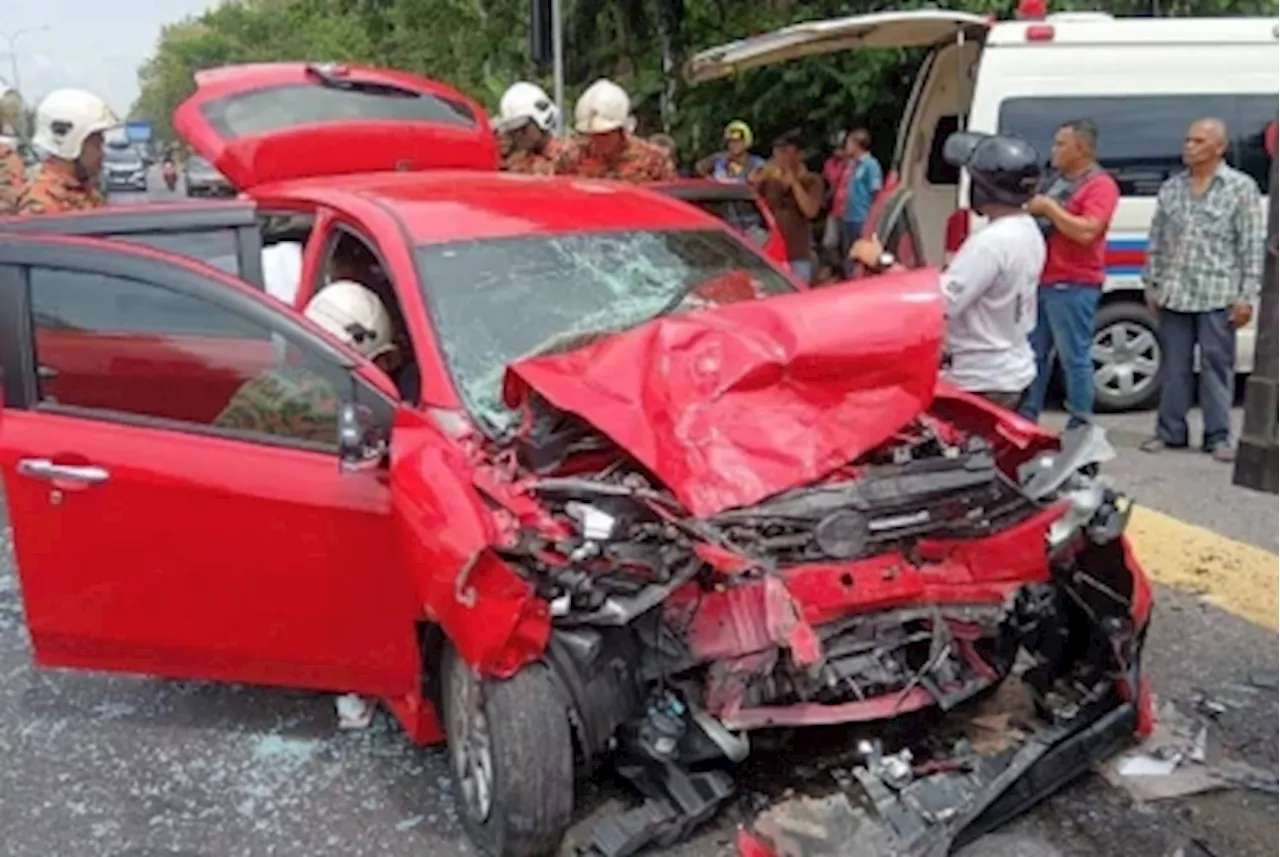 Woman dies in crash with lorry after running red light while rushing injured son to Jitra hospital