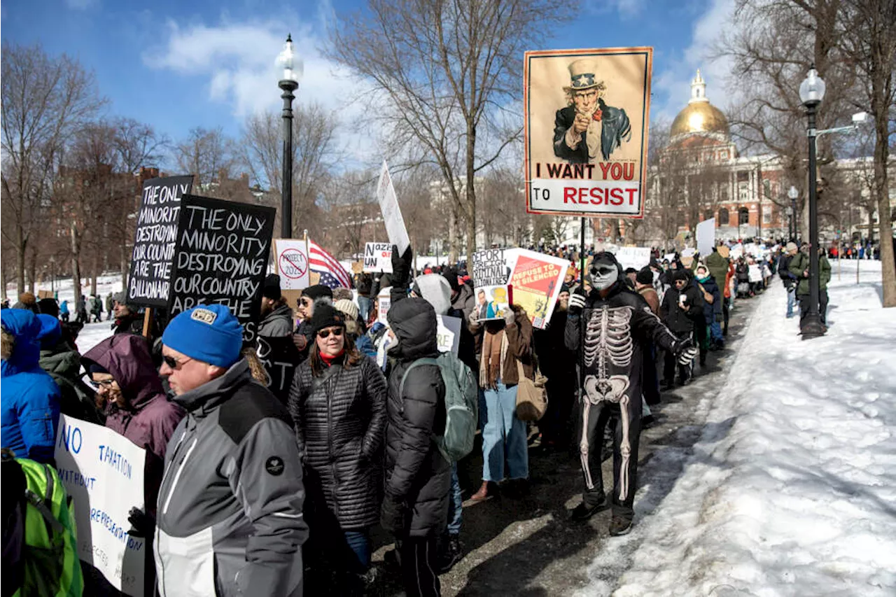 Protesters March Against Trump in Boston on Presidents Day