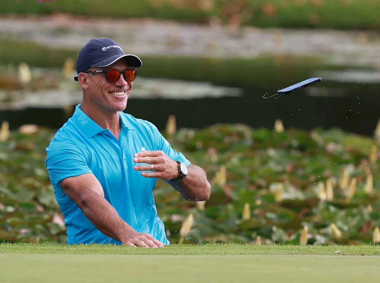Former Springbok star takes an unexpected dip in golf water hazard