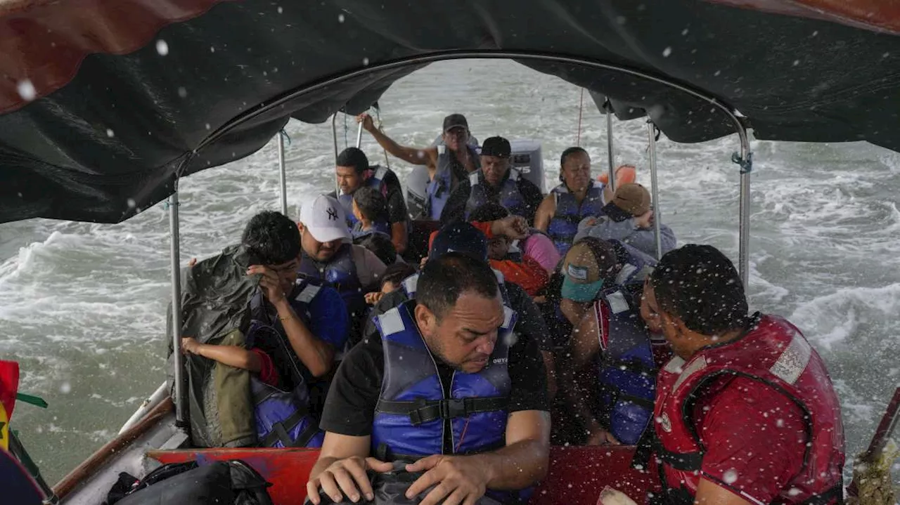A 'reverse flow': Boat-by-boat, migrants are turning back