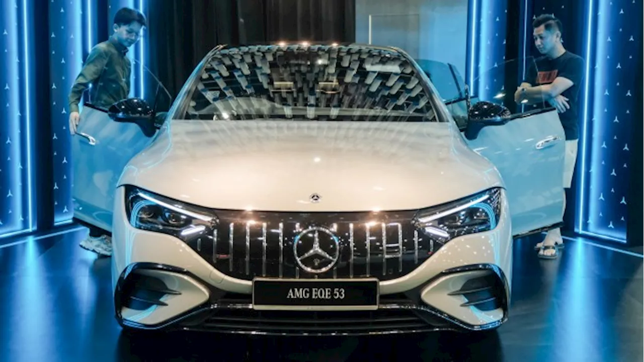 Carmakers turn to new hybrid and petrol models to bolster profits