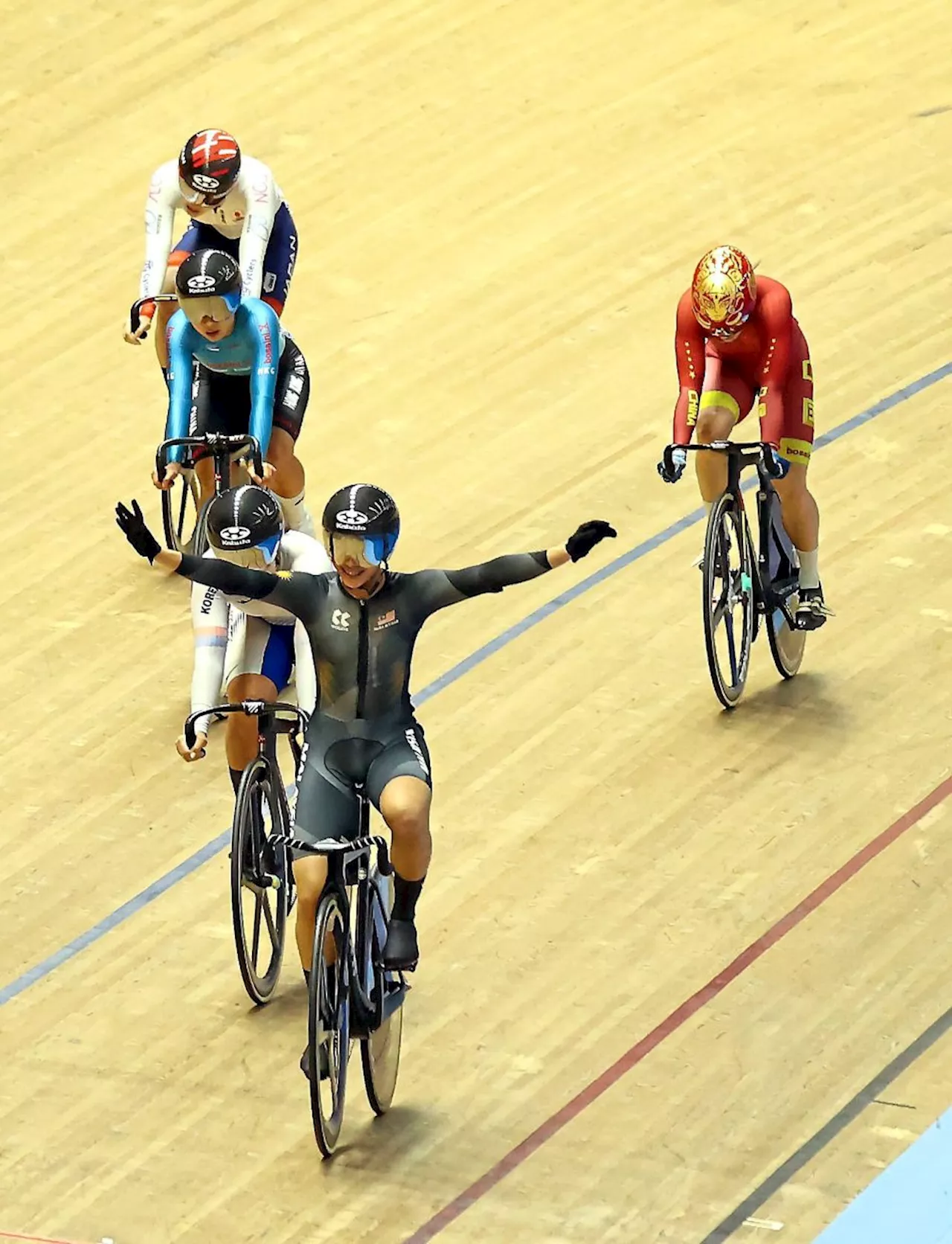 Cyclist Izzah sizzles with another gold in Asian meet