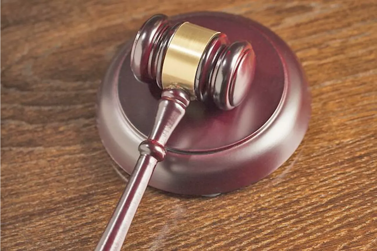 Five men fined RM2,000 each in assault case, one claims trial