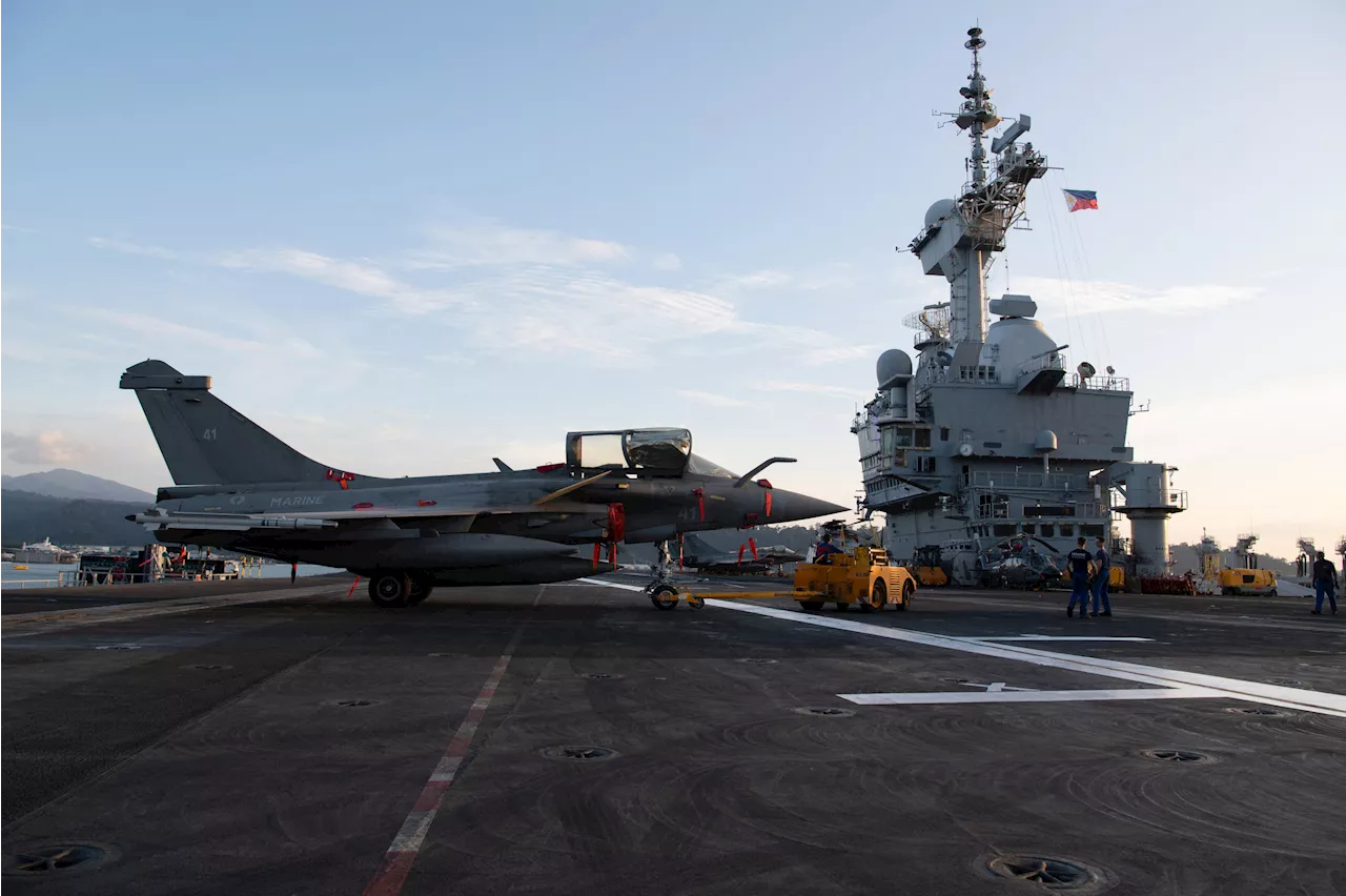 China and French navy aircraft carriers operate in South China Sea