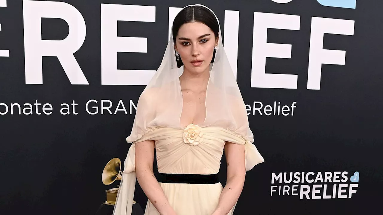 Gracie Abrams wears bizarre bridal look at Grammys 2025 amid rumors she's split from boyfriend Paul...