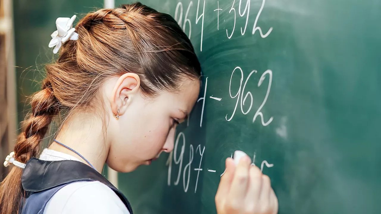 Bad at maths? Blame your mum and dad! Parents pass their anxiety about numbers on to their children,...